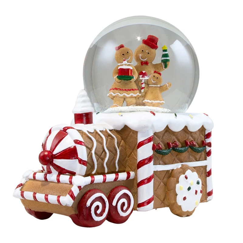 Schneekugel mit Spieluhr 17cm Lebkuchenfigur im Zug