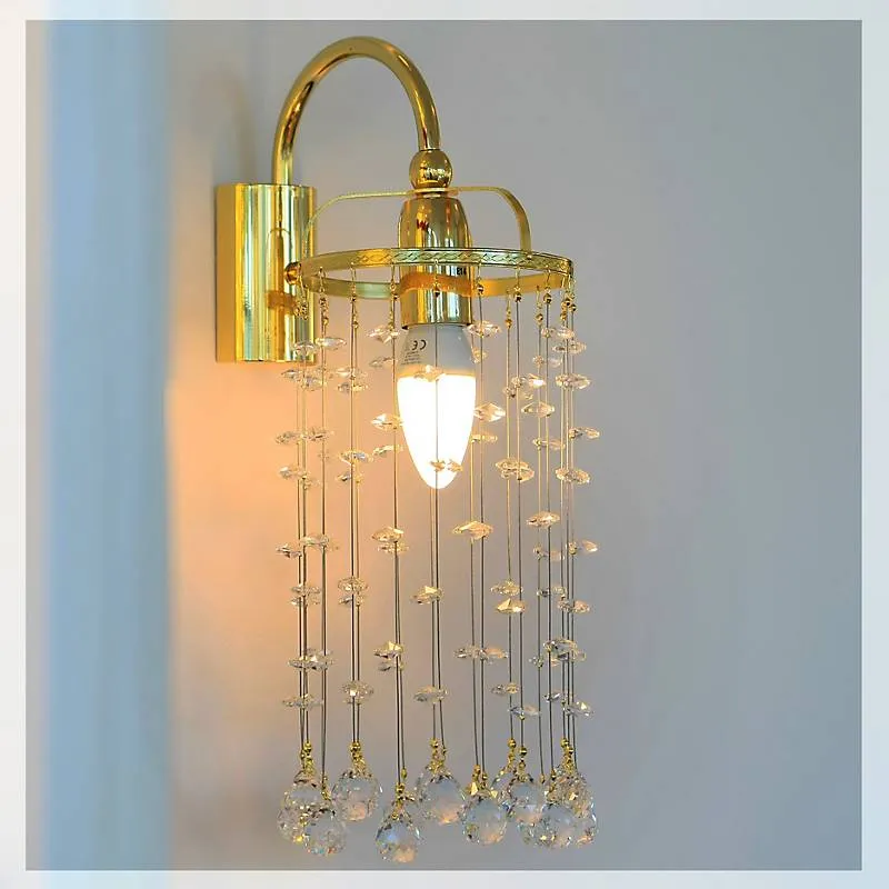 Wandleuchter Tialda Erleuchtung, Gold/Transparent, aus Glas