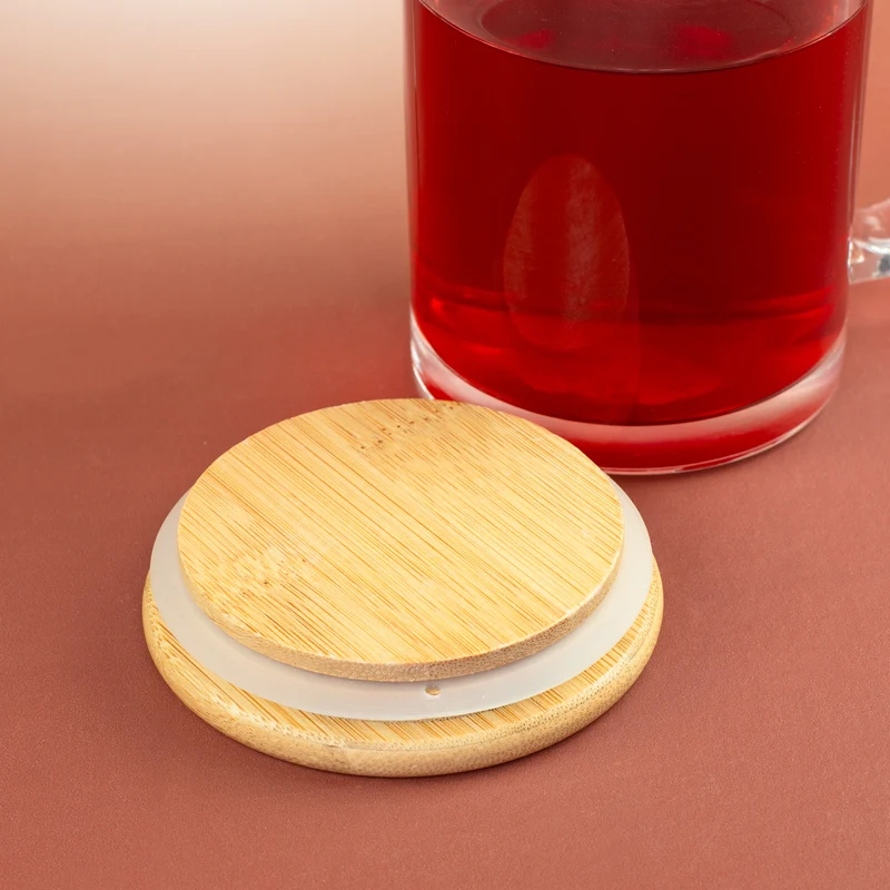 Tasse aus Glas mit Bambusdeckel 'Komme was Wolle' Motiv | Geschenk für Strickfans & Handarbeit