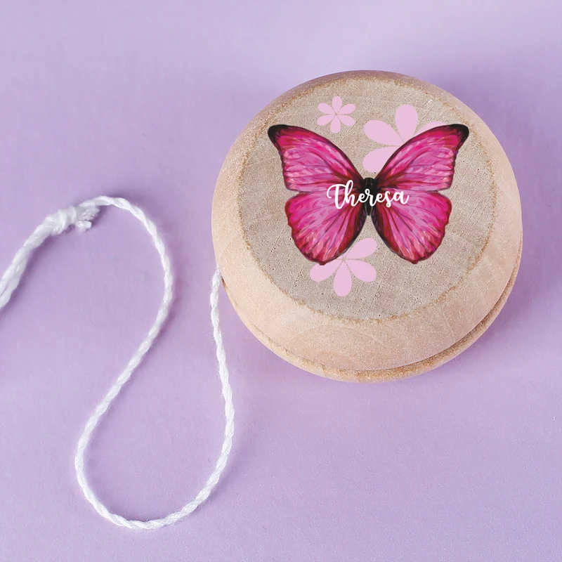 Personalisiertes JoJo aus Holz im Retrodesign für Mädchen mit Name und Schmetterling Motiv