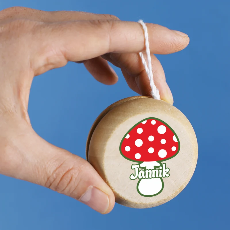 Personalisiertes JoJo aus Holz im Retrodesign für Einschulung & Geburtstag | Glückspilz Motiv