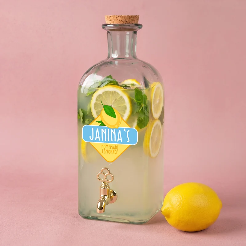 Personalisierter Getränkespender aus Glas mit Zitrone Motiv und Hahn | 2L Spender für Limonade & Saft