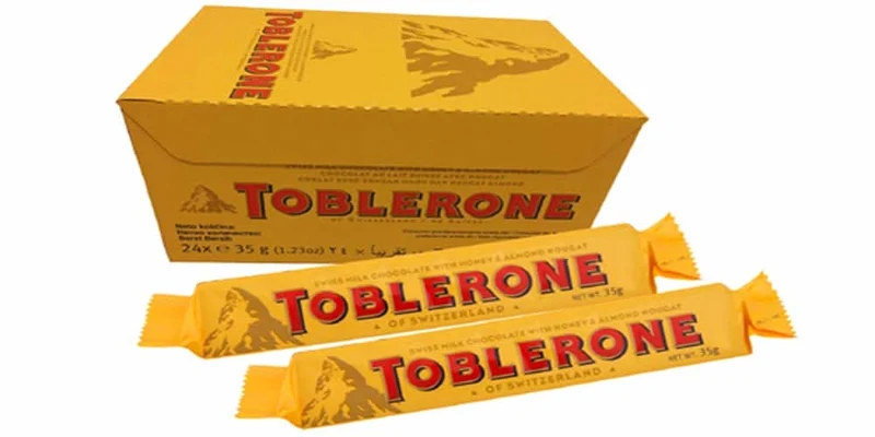 Toblerone Schweizer Milchschokolade mit Honig- und Mandel-Torrone - 24x35g