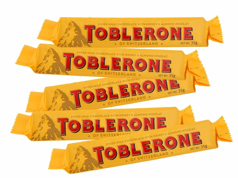 Toblerone Schweizer Milchschokolade mit Honig- und Mandel-Torrone - 24x35g