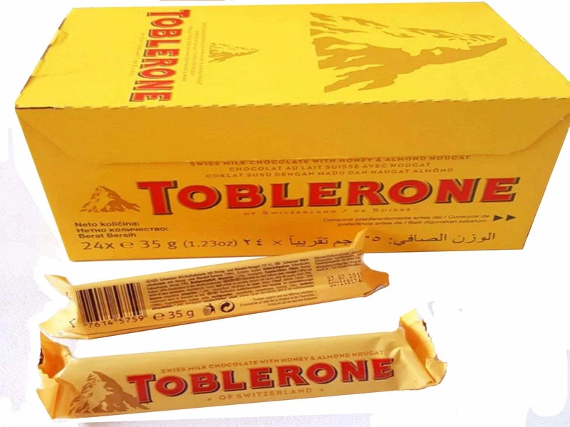 Toblerone Schweizer Milchschokolade mit Honig- und Mandel-Torrone - 24x35g