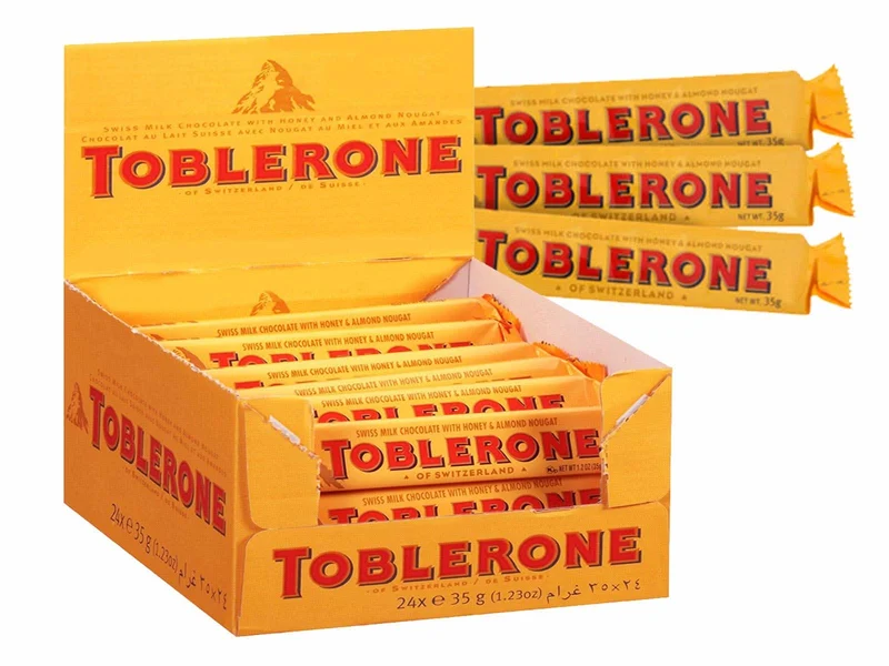 Toblerone Schweizer Milchschokolade mit Honig- und Mandel-Torrone - 24x35g