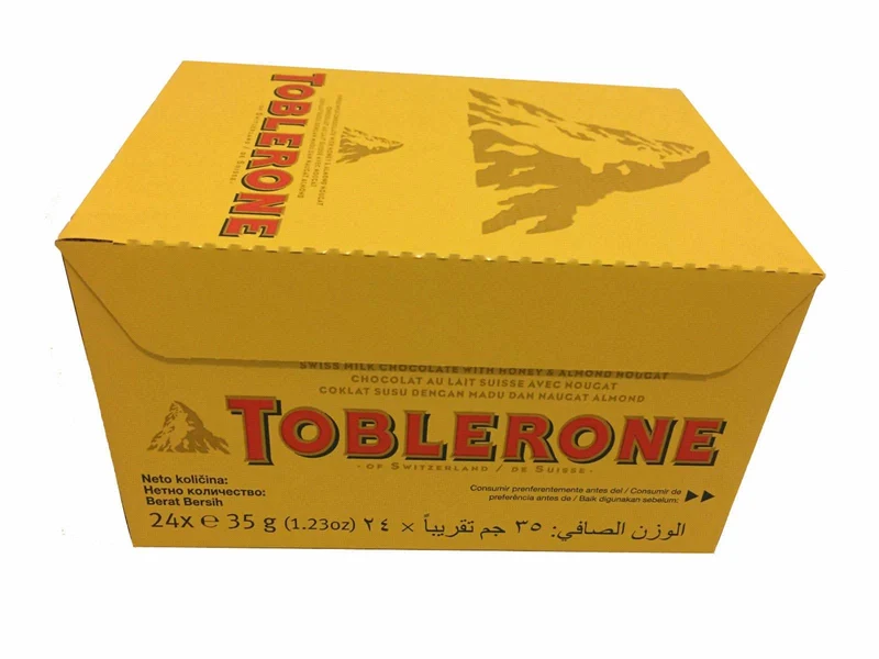 Toblerone Schweizer Milchschokolade mit Honig- und Mandel-Torrone - 24x35g