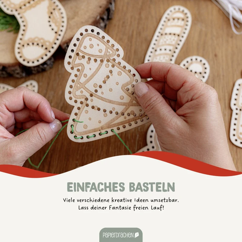 Fädelset aus Holz zu Weihnachten