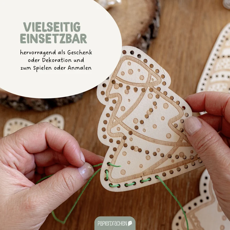 Fädelset aus Holz zu Weihnachten
