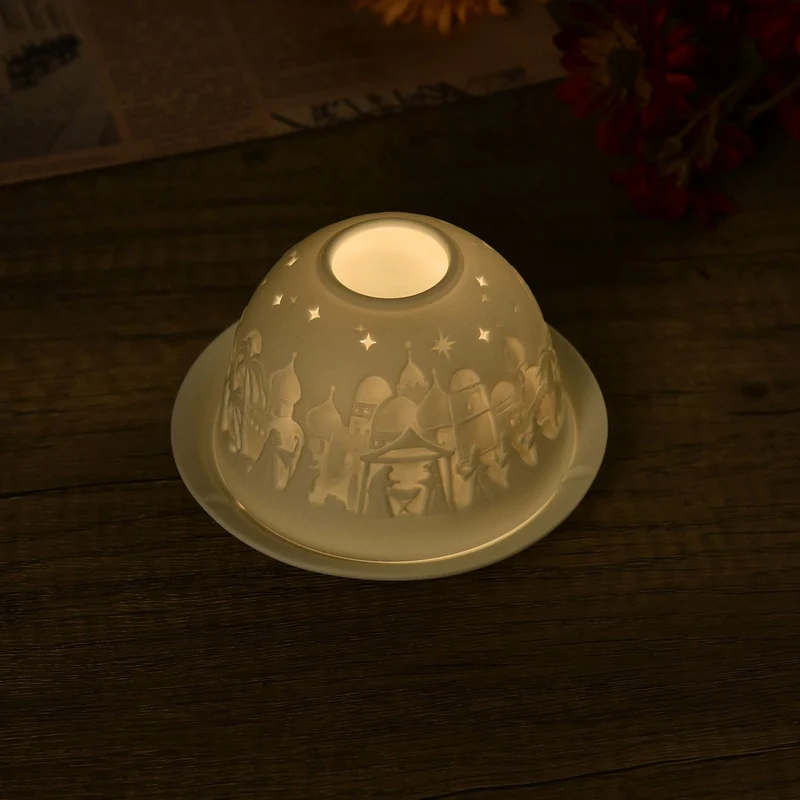 Tealight Candle Holder with LED light Pattern:Bethlehem Made in an unglazed white porcelain Size:Dia10.5xH7.5CM LED Battery: 2*CR2032 Weight:161g Color:white