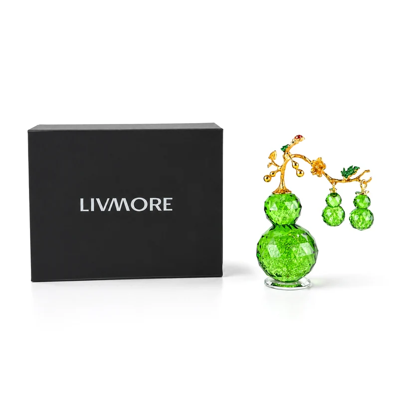 LIVMORE Deko-Ornament mit facettierten Glaskürbissen und goldfarbenem Zierzweig, 20x15cm, Grün