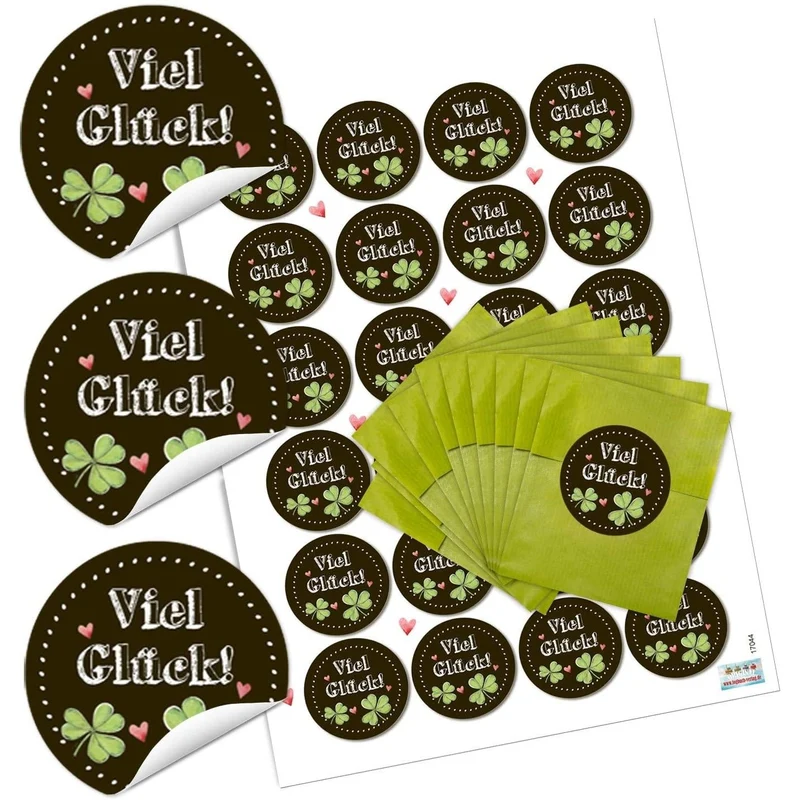 Grüne Flachbeutel aus Papier mit runden Aufklebern „Viel Glück“