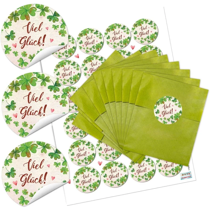 Grüne Flachbeutel aus Papier mit runden Aufklebern „Viel Glück“