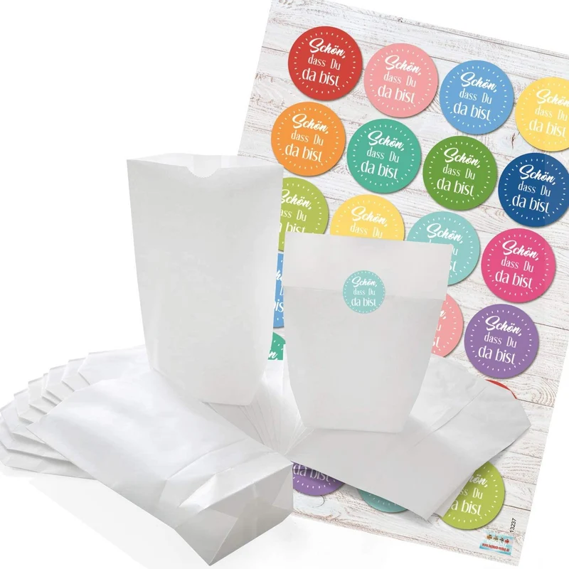 Papiertüten mit Boden mit Aufklebern „Danke“ und „Schön, dass du da bist“ in vielen Farben