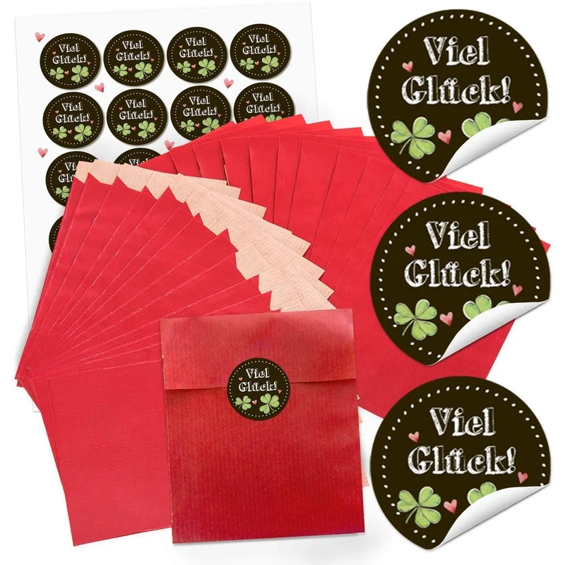 Rote Flachbeutel aus Papier 13 x 18 cm mit runden Aufklebern „Viel Glück“ in zwei Farben