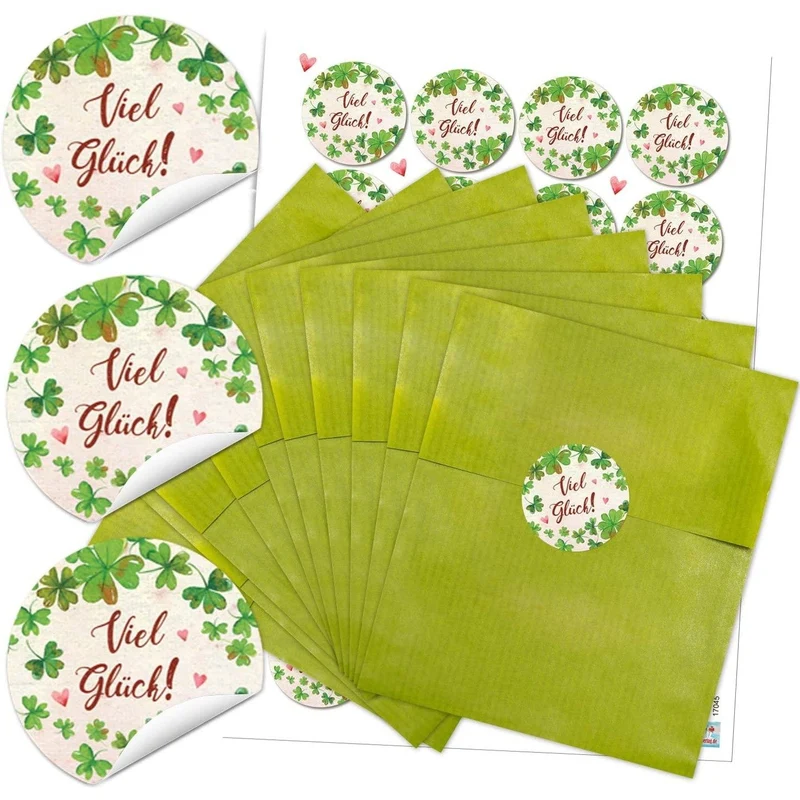 Grüne Flachbeutel aus Papier 13 x 18 cm mit runden Aufklebern „Viel Glück“ in zwei Farben