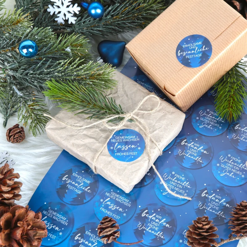 Logbuch-Verlag 24 runde Weihnachtsaufkleber blau weiß Weihnachtsgrüße Firma Shop Business - Weihnachtssticker für Kunden Mitarbeiter Geschenke Ø 4 cm